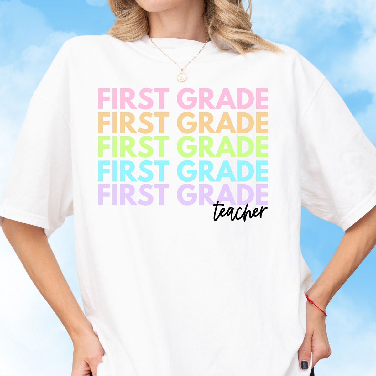 First Grade Rainbow Repeat Tee